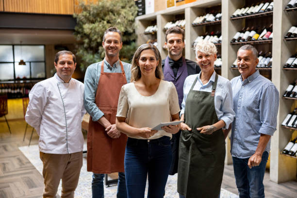 istock Happy staff working at a restaurant 1495390714