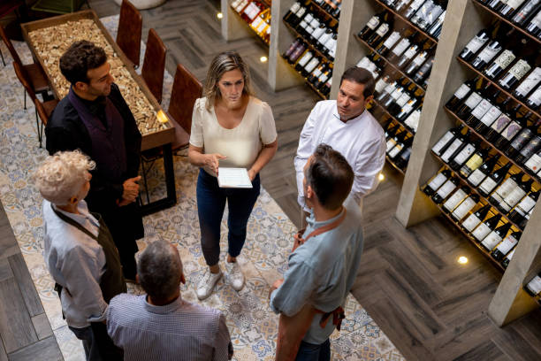 istock Restaurant owner having a meeting with her staff 1495390735