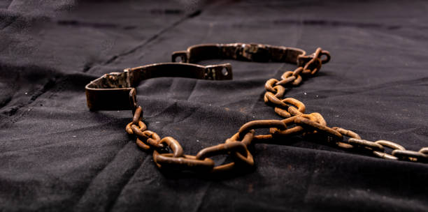 istock Old chains or handcuffs used to hold prisoners or slaves 1495391505