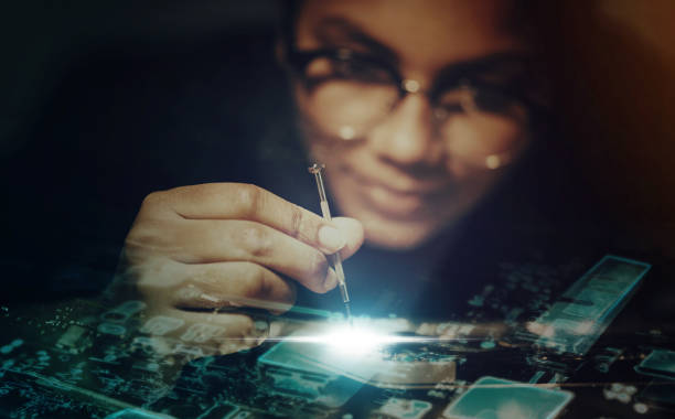 istock Computer motherboard, screwdriver and technician hand with overlay for repair, maintenance or IT solution. Information technology engineer, woman and night for pc programmer with circuit, cpu and job 1495393851
