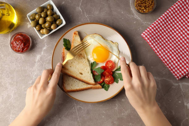 istock Concept of tasty breakfast on gray textured background 1495395940