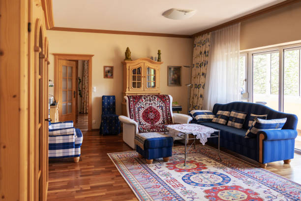 istock Private interior, a room with a sofa, armchairs, wardrobes and a large panoramic window with access to the loggia 1495396949