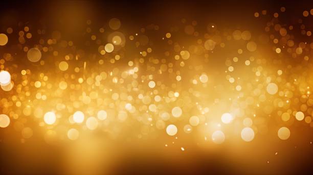 istock Gold glitters background. shimmering blur spot lights Bokeh Shiny gold light background texture. 1495398512