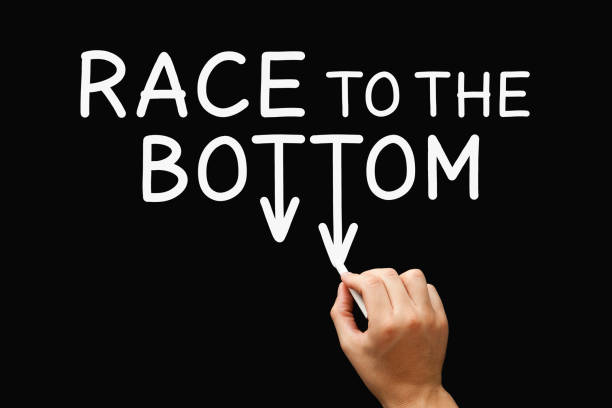 istock Race To The Bottom Dumping Competition Concept 1495398862