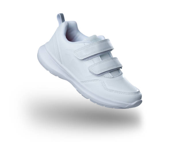 istock Small child sport shoes on white background 1495400015