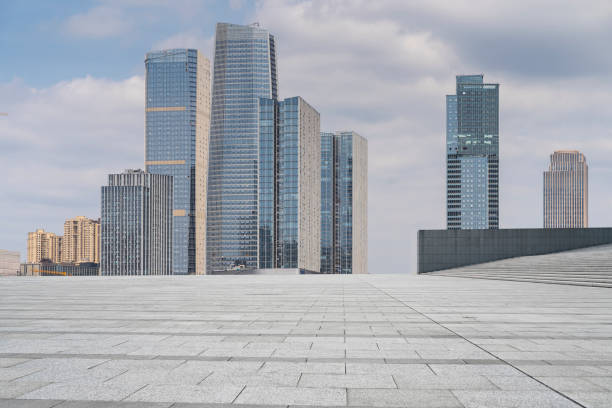 istock empty concrete ground floor with modern cityscape. 1495403259