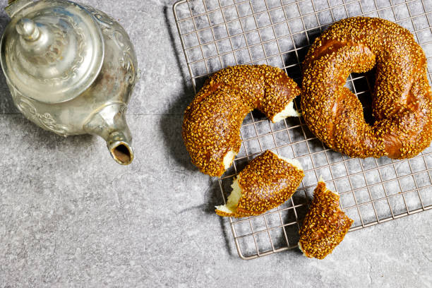 istock Traditional turkish breakfast with simit bagels on grill with teapot 1495406287
