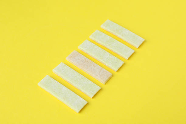 istock Chewing or bubble gum on yellow background 1495419025