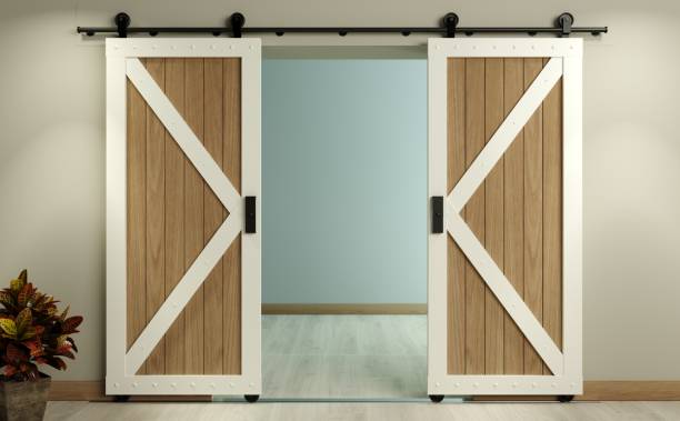 Barn Sliding Wooden Door in Loft Room 3d illustration. Modern interior in loft style barn sliding wooden door in loft room. Studio interior of old house garret stock pictures, royalty-free photos & images