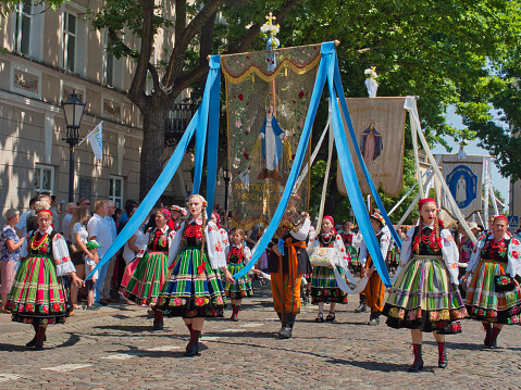 Residents of Lowicz in beautiful regional costumes during the procession on the feast of Corpus Christi.