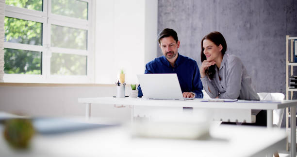 istock Business People Training On Computer. Young Woman 1495428762