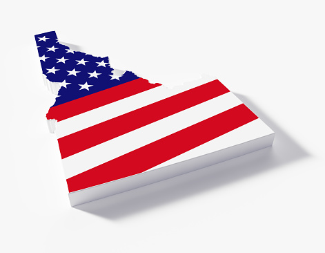 State border of Idaho textured with American flag on white background.