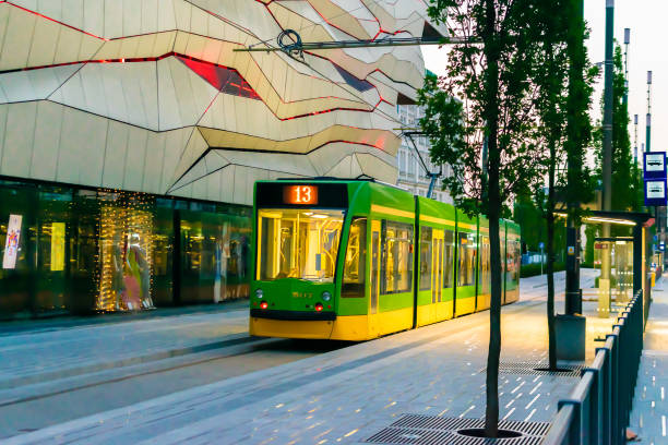 Pozna, Poland -27.05.2023- running greens and yellow trams in Pozna