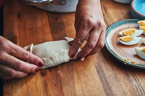 Argentinean empanadas are a delicious and popular dish that can be filled with various ingredients. One of the classic fillings is a combination of meat and vegetables