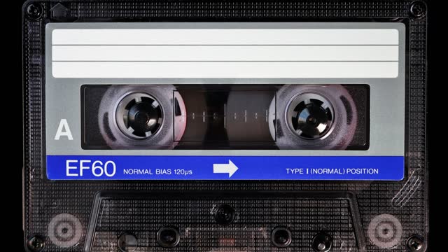 Audio cassette tape in use for sound recording in the tape recorder