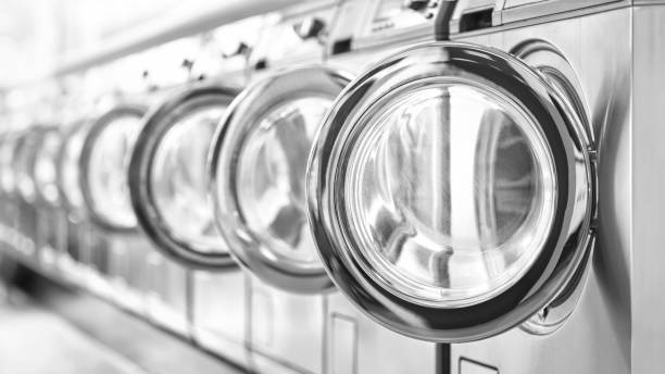 istock Washing machines in a public laundromat 1495453341