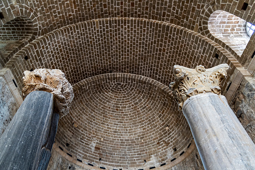 Bergama, Turkey - August 26, 2023:ACROPOLIS OF PERGAMON\nIn 2014, Bergama was included in the World Cultural Heritage List. Although Bergama has been subjected to invasions and destructions throughout its history, it has been continuously inhabited due to its strategic location and is one of the settlements that have never disappeared from the stage of history.  \n Local and foreign tourists visit here