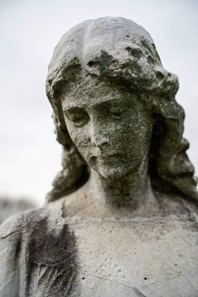 istock Religious sculpture in cemetery 1495459667