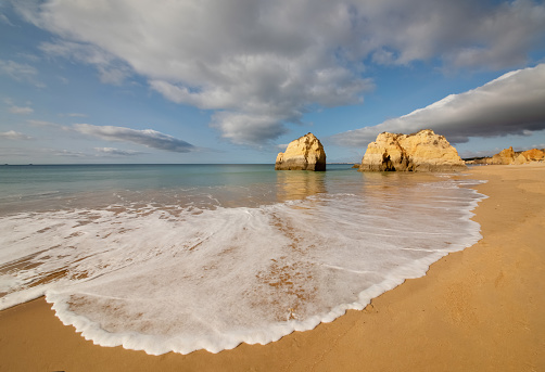 Atlantic Ocean Coast with waves background Travel holiday sea concept. Algarve Portugal