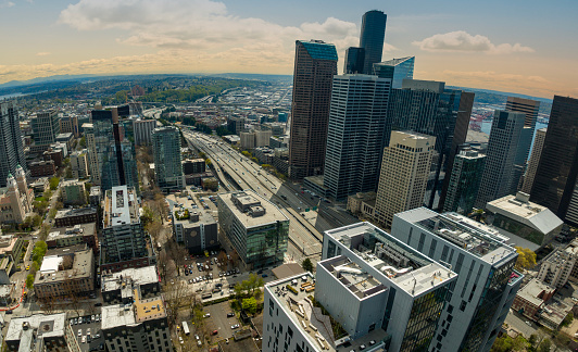 Establishing Shot From the Center of Seattle Washington Downtown Skyscrapers Aerial Wide Angle Perspective Above I-5 Amongst Skyscrapers
