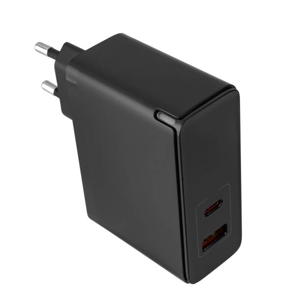 istock Power adapter for phone, white background in insulation 1495470145