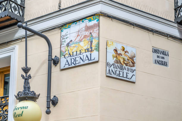 Madrid, Spain - October 4, 2021: Beautiful tiled street signs in Madrid, Spain, designed in the 90's by ceramic artist Alfredo Ruiz de Luna