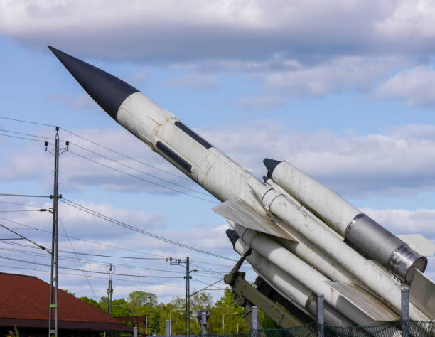 istock Low angle view of a old missile against the sky 1495484923