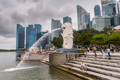 singapore. 14 th april, 2023: merlion statue is the icone of the city that is located in marina bay sands, singapore