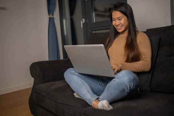 istock Young woman working from home 1495500797