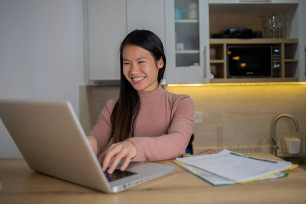 istock Young woman working from home 1495500898