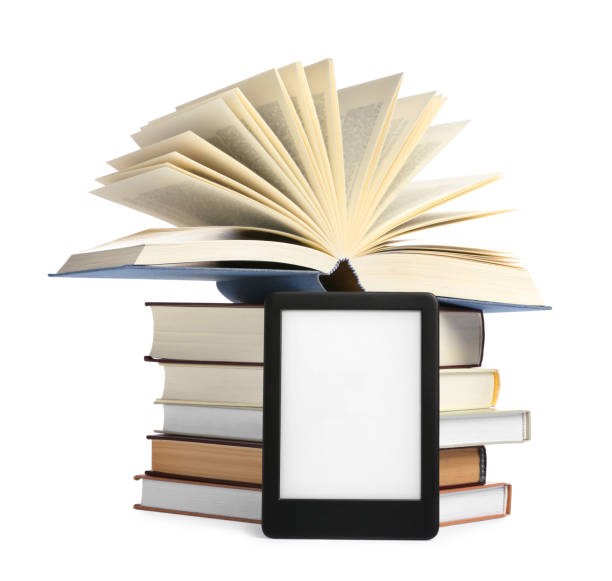 istock Modern e-book and stack of hardcover books isolated on white 1495506464