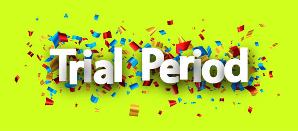 istock Trial period sign over colorful cut out foil ribbon confetti background. 1495516840