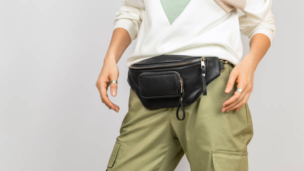 istock Black Genuine Leather Belt Bag on a Woman 1495520851