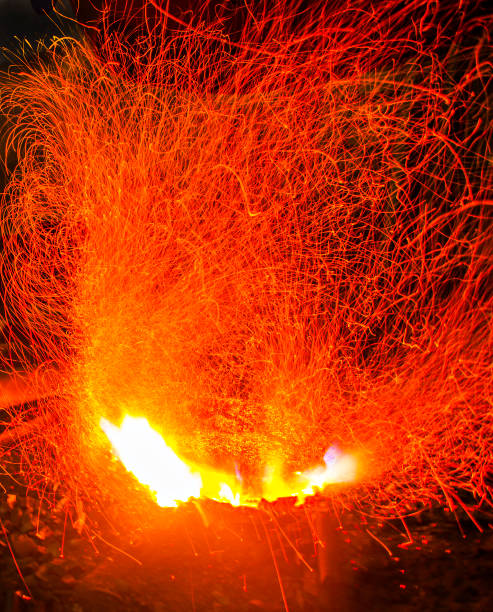 istock Line of Fire from a traditional blacksmith when making a gong, a traditional music tool from Java, Indonesia. 1495529158