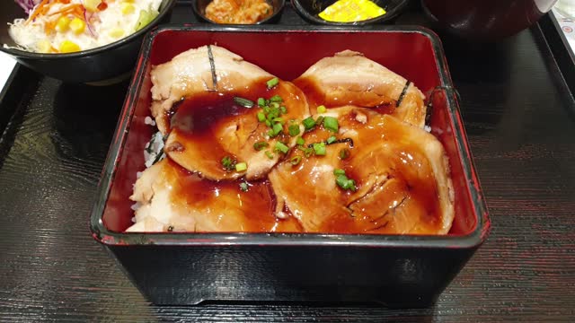 Grilled pork on bento box. Japanese food.
