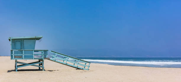 istock Lifeguard hut on Santa Monica beach. Pacific ocean coastline Los 1495545136