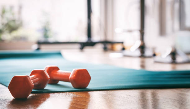 Pair of dumbbells on a wooden floor