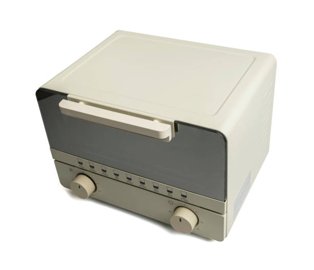 Light yellow electric oven isolated on a white background