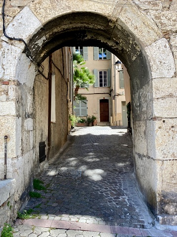 istock France - Côte d’Azur - Antibes - Little street un the old town 1495559691