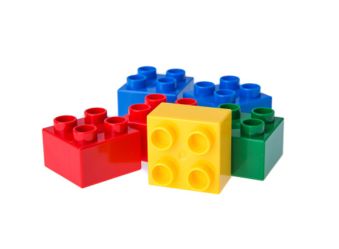 Plastic building blocks isolated on white background