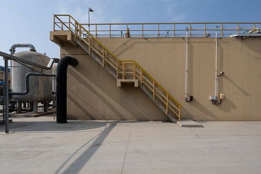 Industrial staircase of chemical plant treatment tank