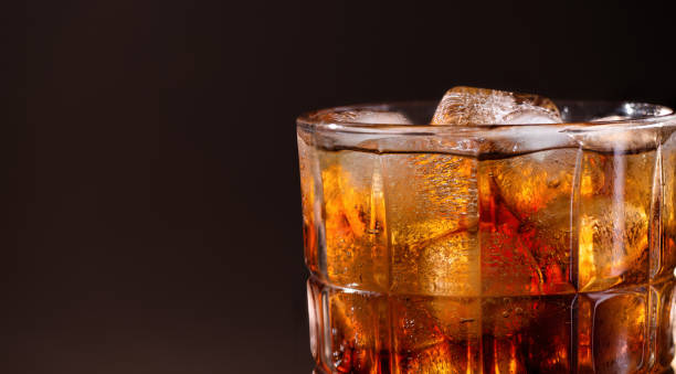 istock A glass of cola drink with ice cubes. 1495565364