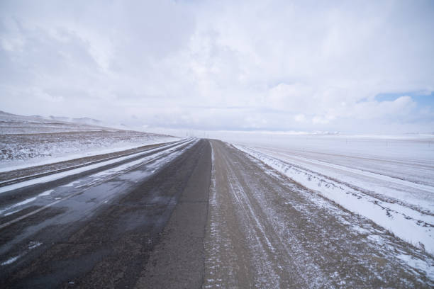 istock Snow covered the highway road in winter, Central Mongolia 1495566403