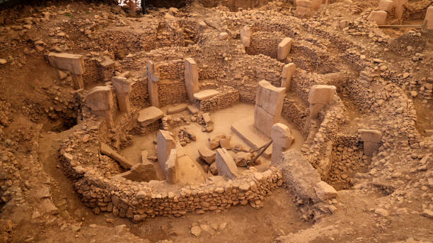 Göbekli Tepe is an archaeological site from the Neolithic period. Göbekli Tepe is an archaeological site from the Neolithic period. B.C. Dating to 9600-9500 BC, the area is one of the oldest historical buildings in the world. megalith stock pictures, royalty-free photos & images