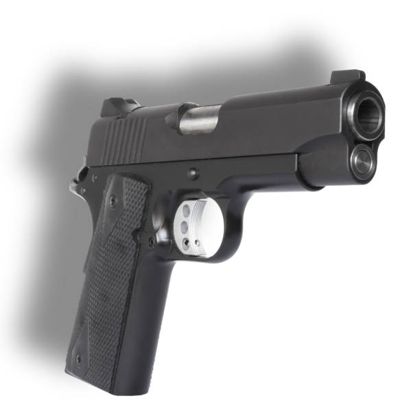 istock Dropshadow behind a big bore 1911 pistol 1495567433