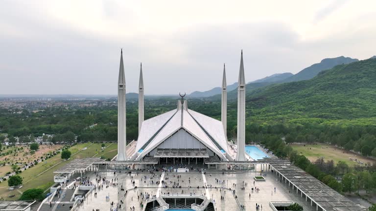 Aerial Drone Sunset Scene of Shah Faisal Mosque is one of the largest Mosques in the World which is situated in Islamabad, Pakistan.