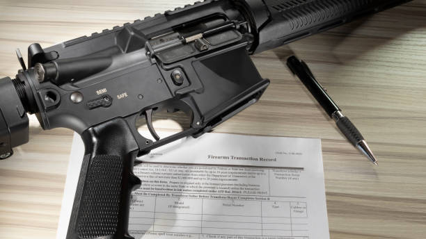 istock Public domain background check to buy an assault rifle 1495575593