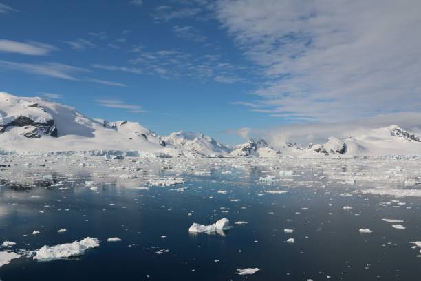 istock Stunning view of a snow-covered landscape with a towering iceberg 1495577165