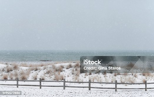 istock A Snowy Winter Landscape by the Lake 1495577880