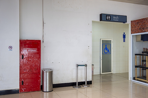 Luang Prabang Airport, Luang Prabang, Laos - March 22th 2023: Entrance to the toilets in the departure area at the airport in the former capital of Laos